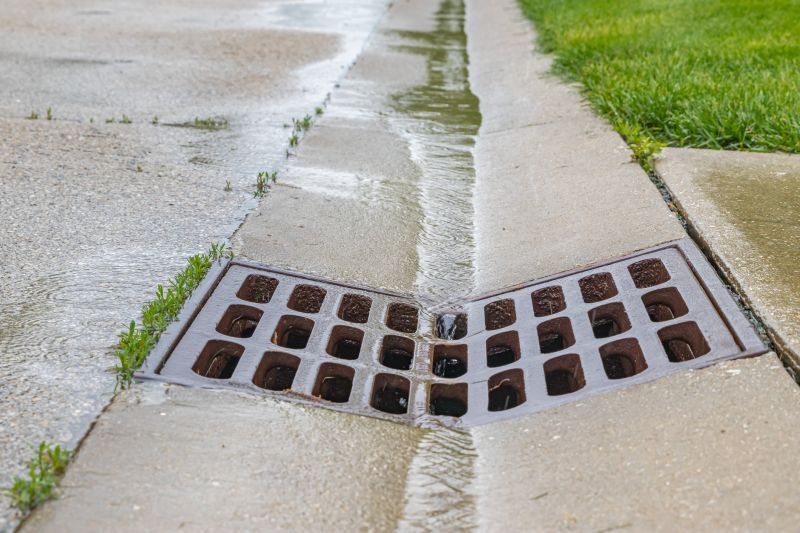 Get Professional Driveway Drain Installation To Preserve Driveway Integrity!